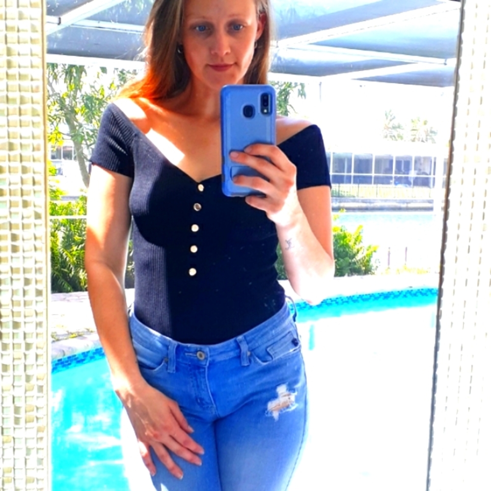 Short sleeve gold buttoned black bodysuit